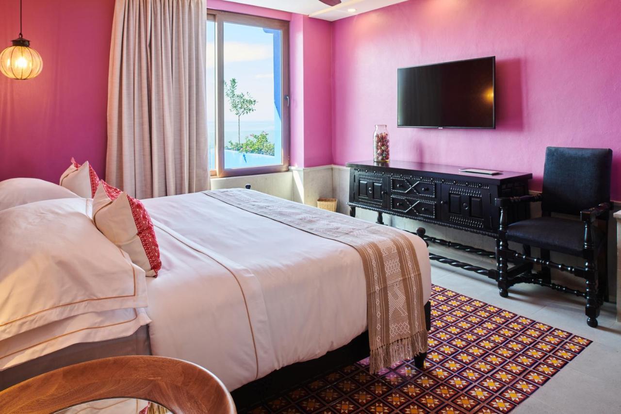 Hotel Luxury Patio Azul (Adults Only) Puerto Vallarta Luaran gambar A bedroom at the hotel